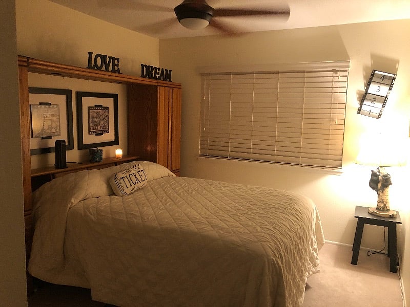 Guest bedroom with queen size bed and ceiling fan/light