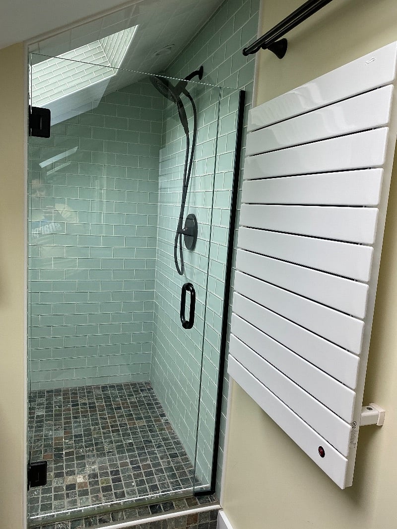 Upstairs bathroom with heated towel warmer.
