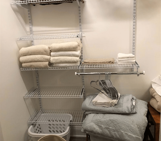 This is half of your two double door spacious closet in the bedroom. The closet includes shelves and hanging space. 