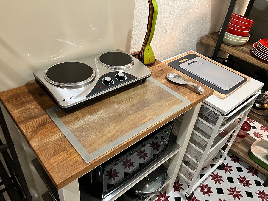 Kitchenette has a double burner, microwave, toaster oven, electric hot water heater, and slow cooker.