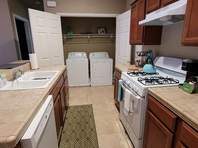 Laundry room conveniently located in your unit.