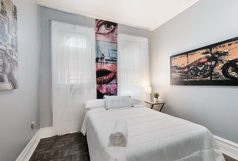 1st Bdrm on the main level has a full bed, closet space, AC, windows for fresh air and private doorway, large room.