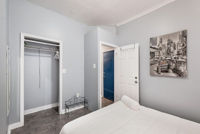 1st Bdrm on the main level has a full bed, closet space, AC, windows for fresh air and private doorway, large room.