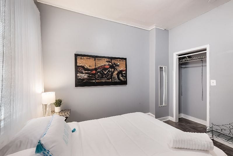 1st Bdrm on the main level has a full bed, closet space, AC, windows for fresh air and private doorway, large room.