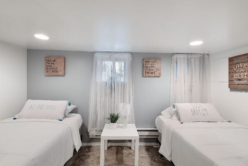3rd Bdrm located on the lower level has two single beds, private doorway, storage space and its a very large room. Great place for peaceful sleep