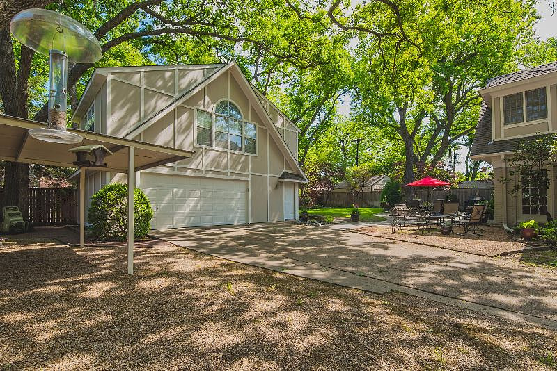 View of the backyard and your carport.