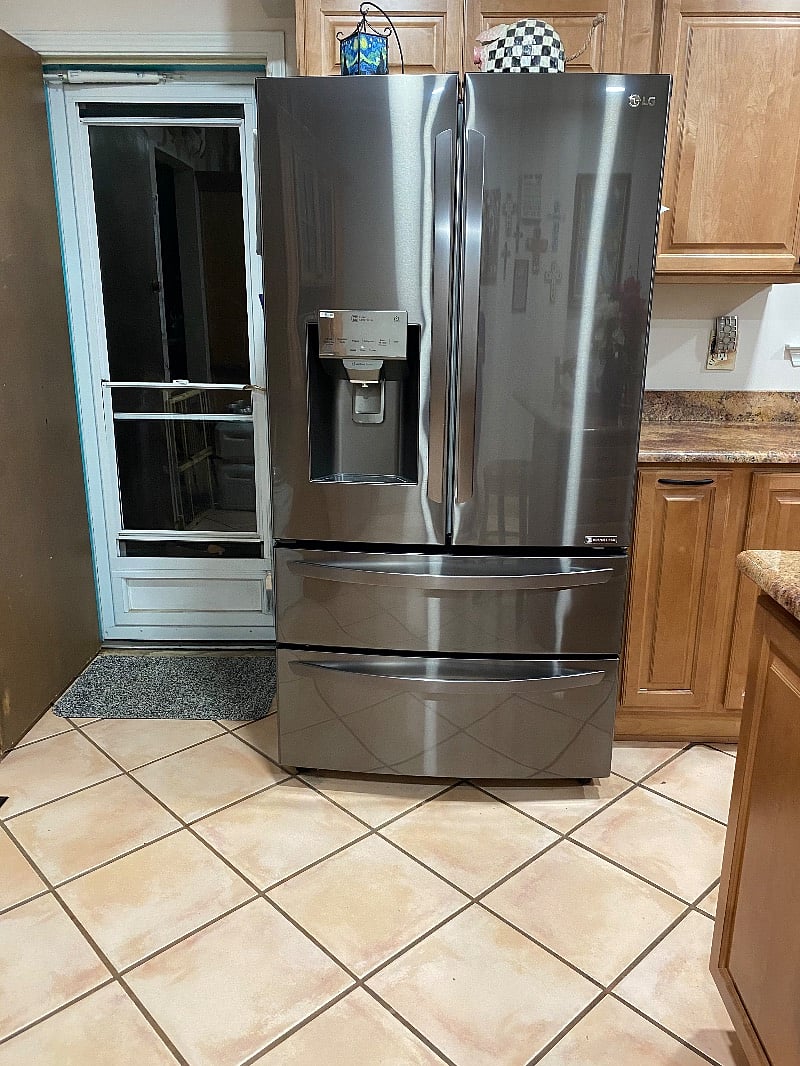 Back door is located in the kitchen and leads to the back yard.