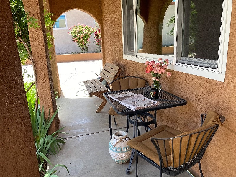 Enjoy your coffee on the front porch in the morning while reading the newspaper.