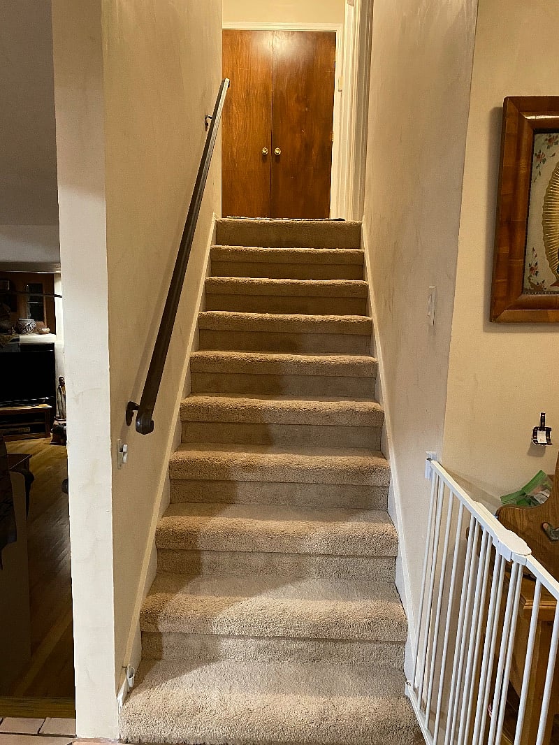 Bedroom is located upstairs.