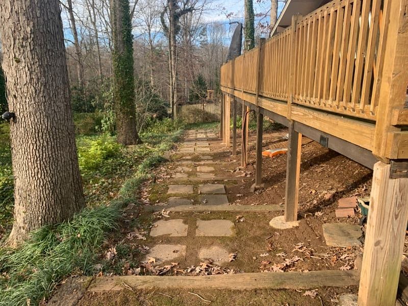 Terraced steps down to Studio. Pathway down lit at night. (Deck on the right)