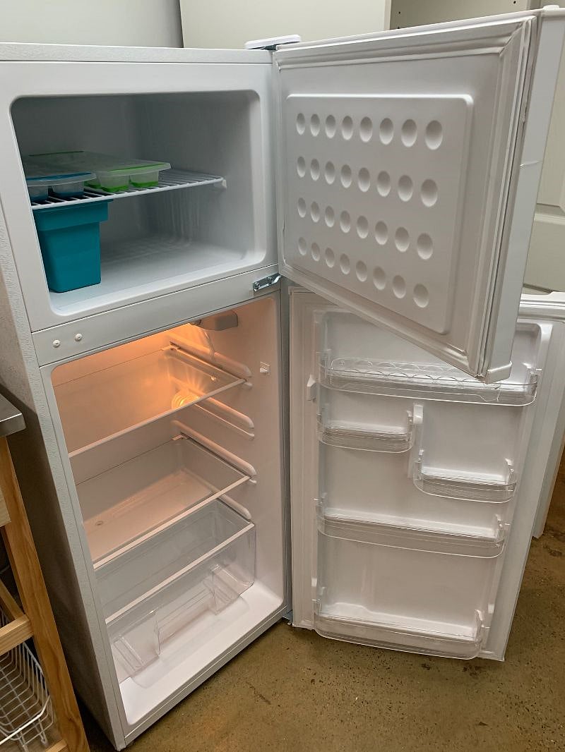 7.5 cu fridge with upper freezer. Very spacious, full apartment size.