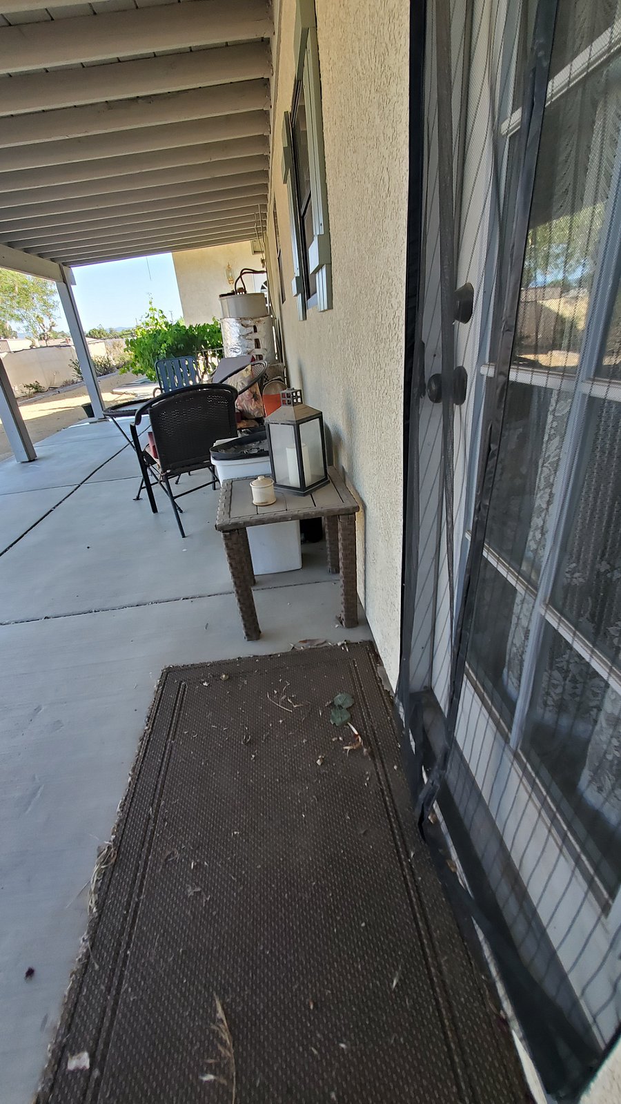 Private back patio shaded year around