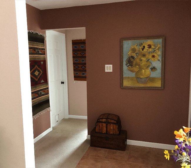 Entry with guest bedroom and bathroom around the wall to the right 