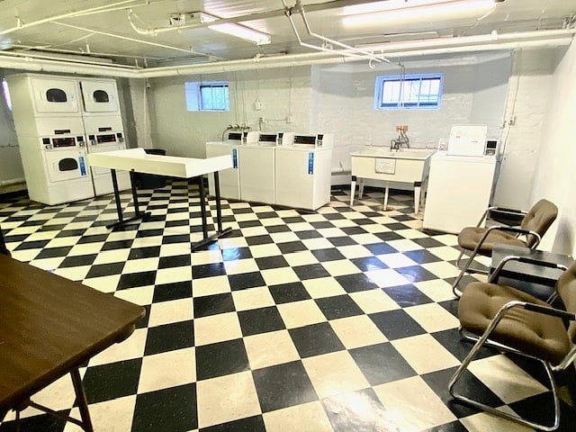 Laundry room with stainless steel tubs. Coinless machines use SHINEPAY app.