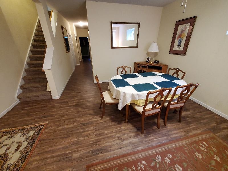 The dining table has seating for six