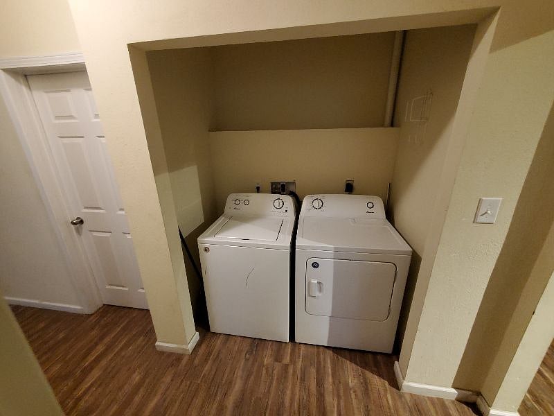 The laundry area is located on the first floor by the kitchen in the main hall. No need to go to the basement or a laundromat to do laundry!