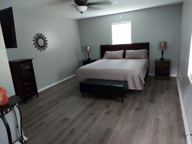 Room # 2
Key entry room, Large room with walk in closet, 50" smart Tv, King size bed, two night stands, private entrance/exit door, room #2 rents for $975 monthly.