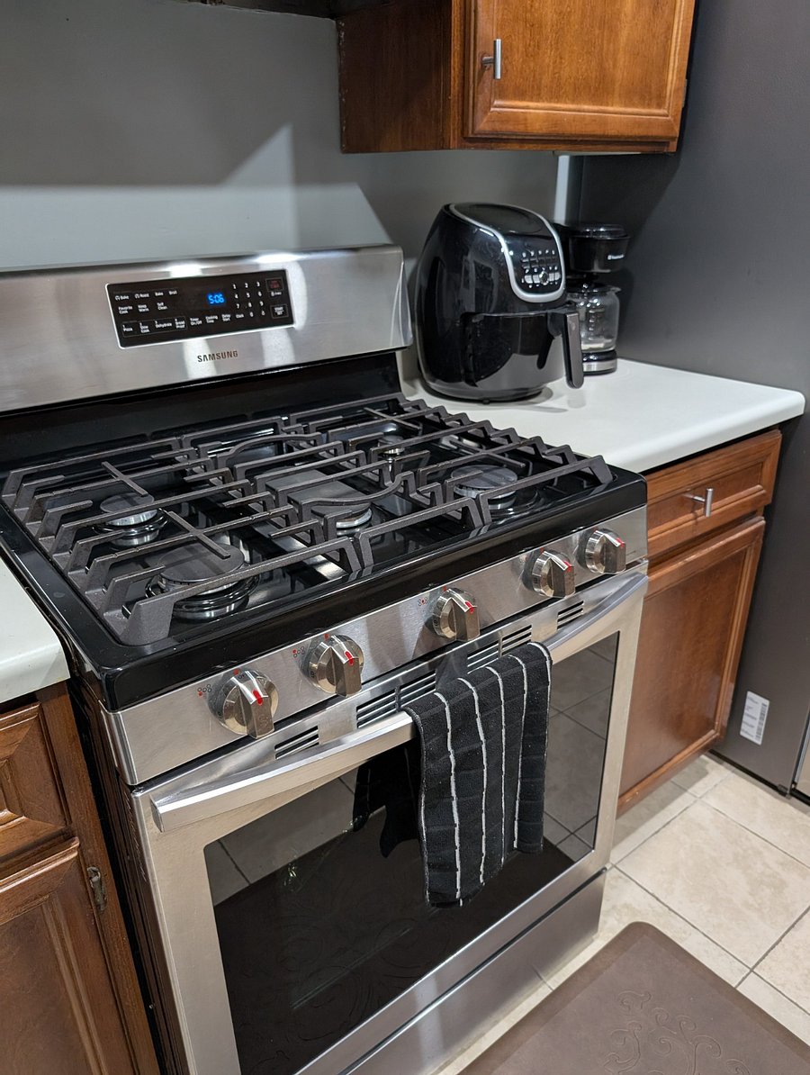 kitchen
5 burners gas stove; stainless refrigerator; stainless dishwasher; garbage disposal