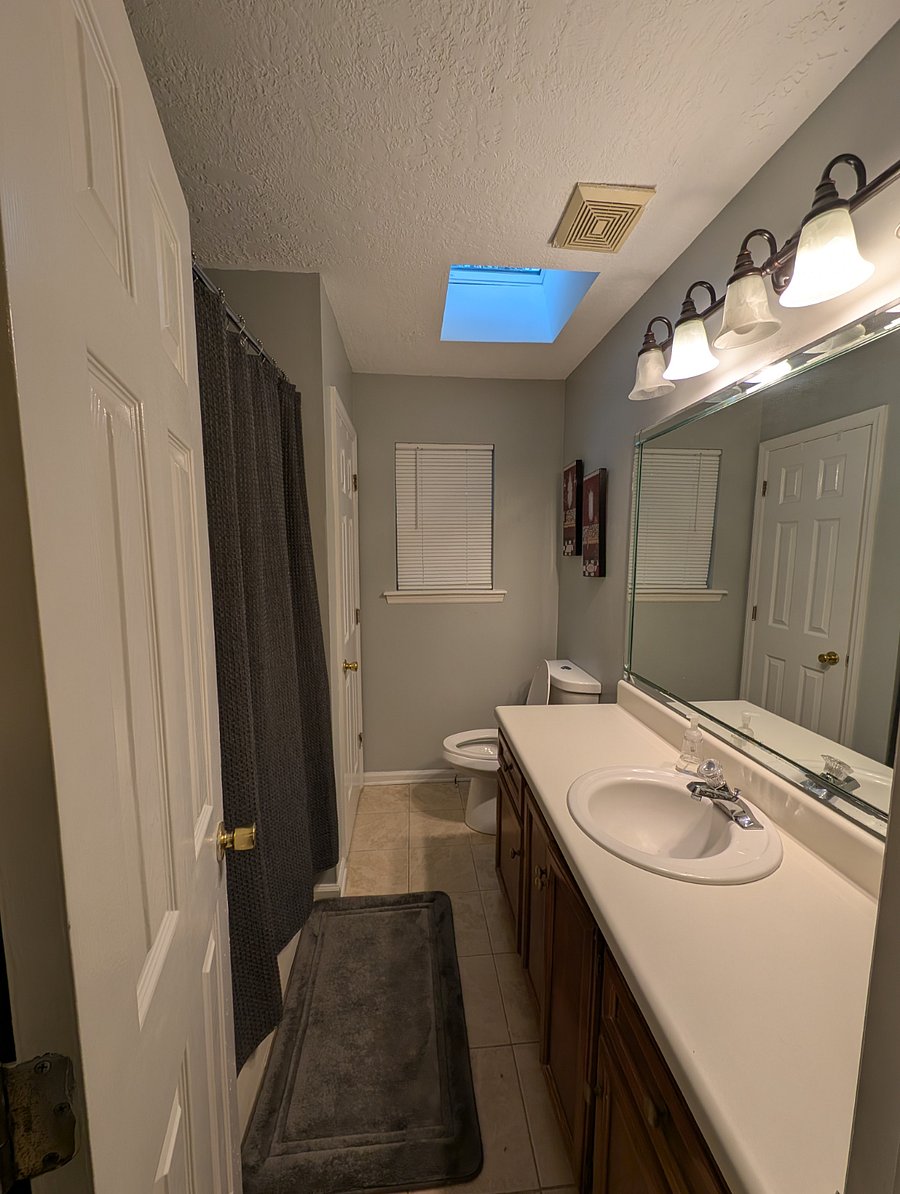 Bedroom #1 private bathroom, full tube, extra large storage closet