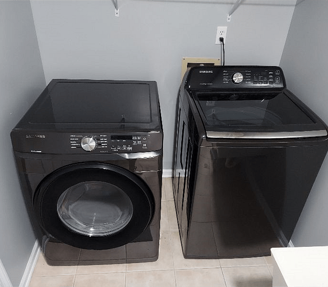 New digital washer, dryer combo, Utility sink, tile floor