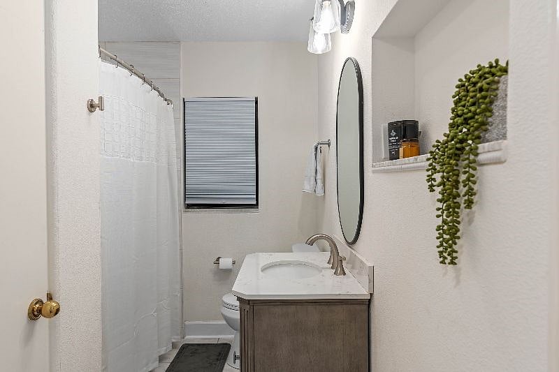 Second bathroom. Standard tub/shower.