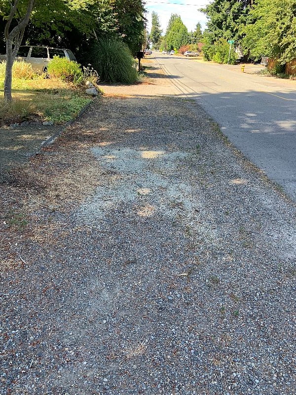 parking strip out front for two cars.