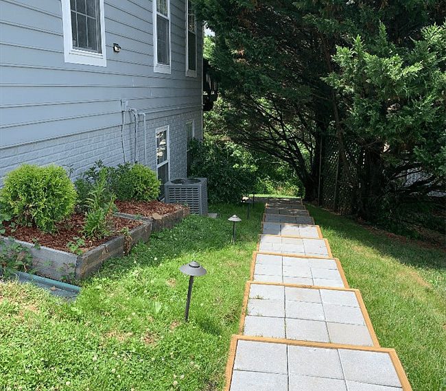 Path to the back of the house where the private entrance is.