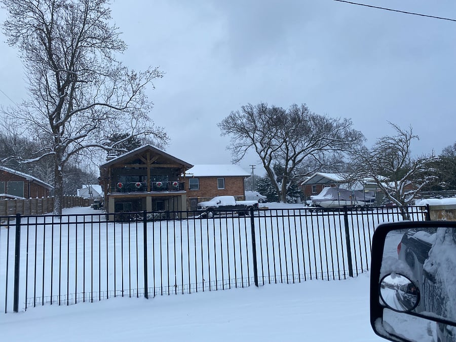back of property , gate leads to beach lakefront
