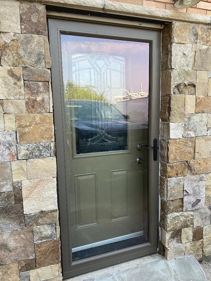 front entrance. designated parking, paved