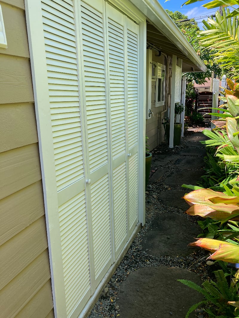 A view of the private utility room and walking path.