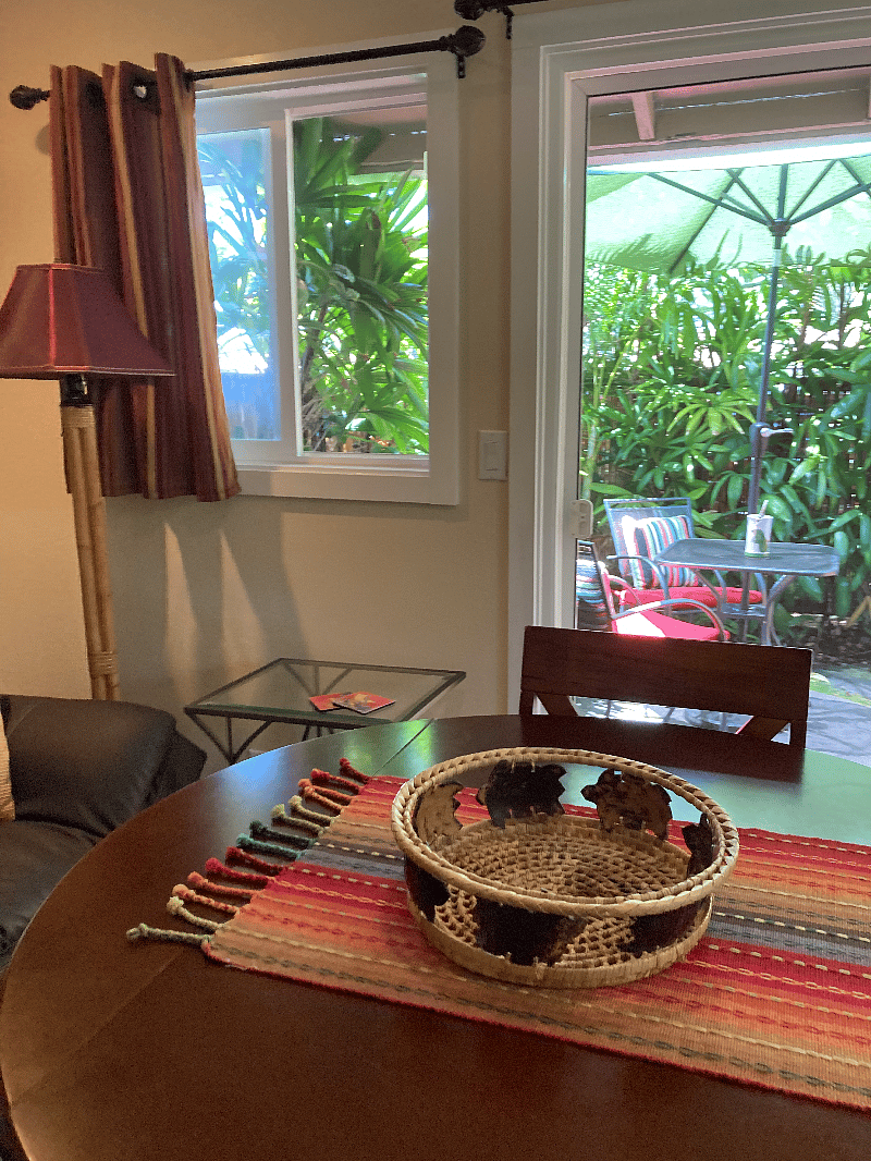 A view to the private outdoor lanai from the sitting/kitchenette room.