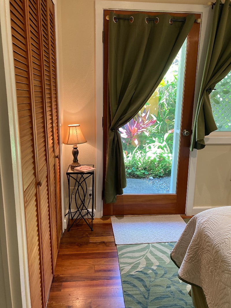 A view of the outdoor walking path from the bedroom.