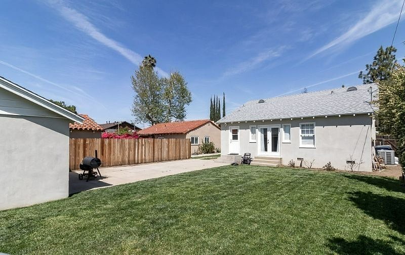 There is plenty of lush green grass to enjoy the outdoor fresh air or let your furry friends run around.