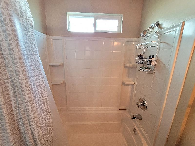 Enjoy a relaxing bath in this XL soaking tub.