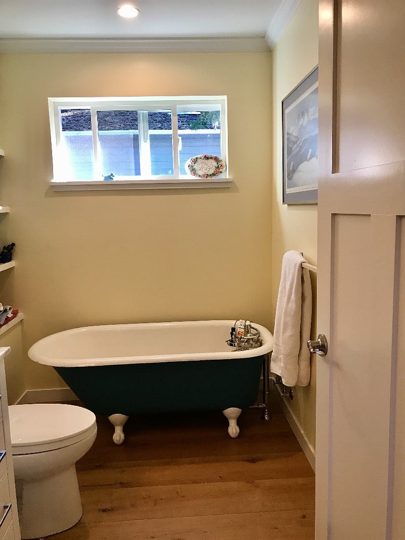 Original claw foot tub in old  1952 bungalow.  hand held shower.