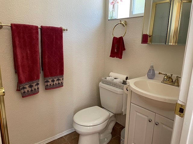 This is the bathroom and the shower is on the other side of the wall