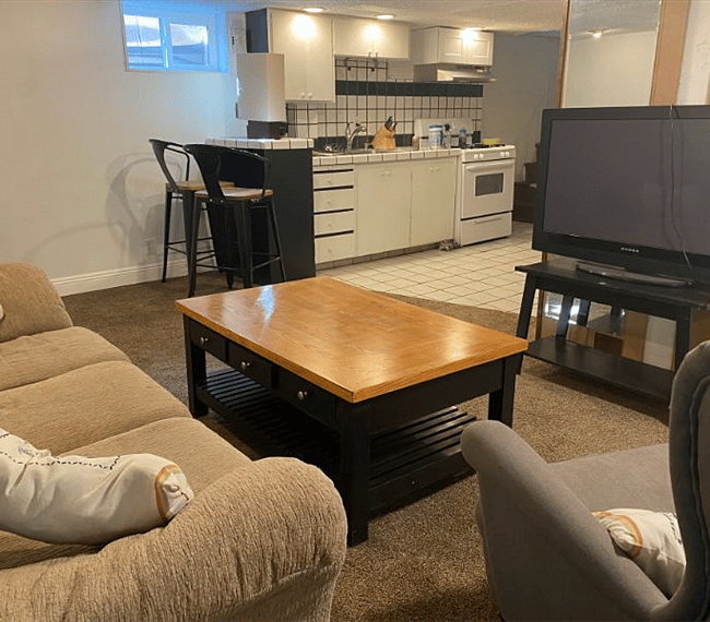 Living room looking at breakfast nook and kitchen