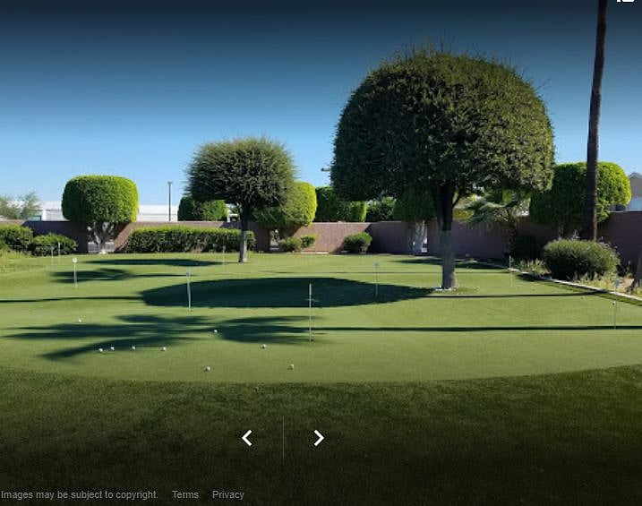 putting green next to the west end pool. 
