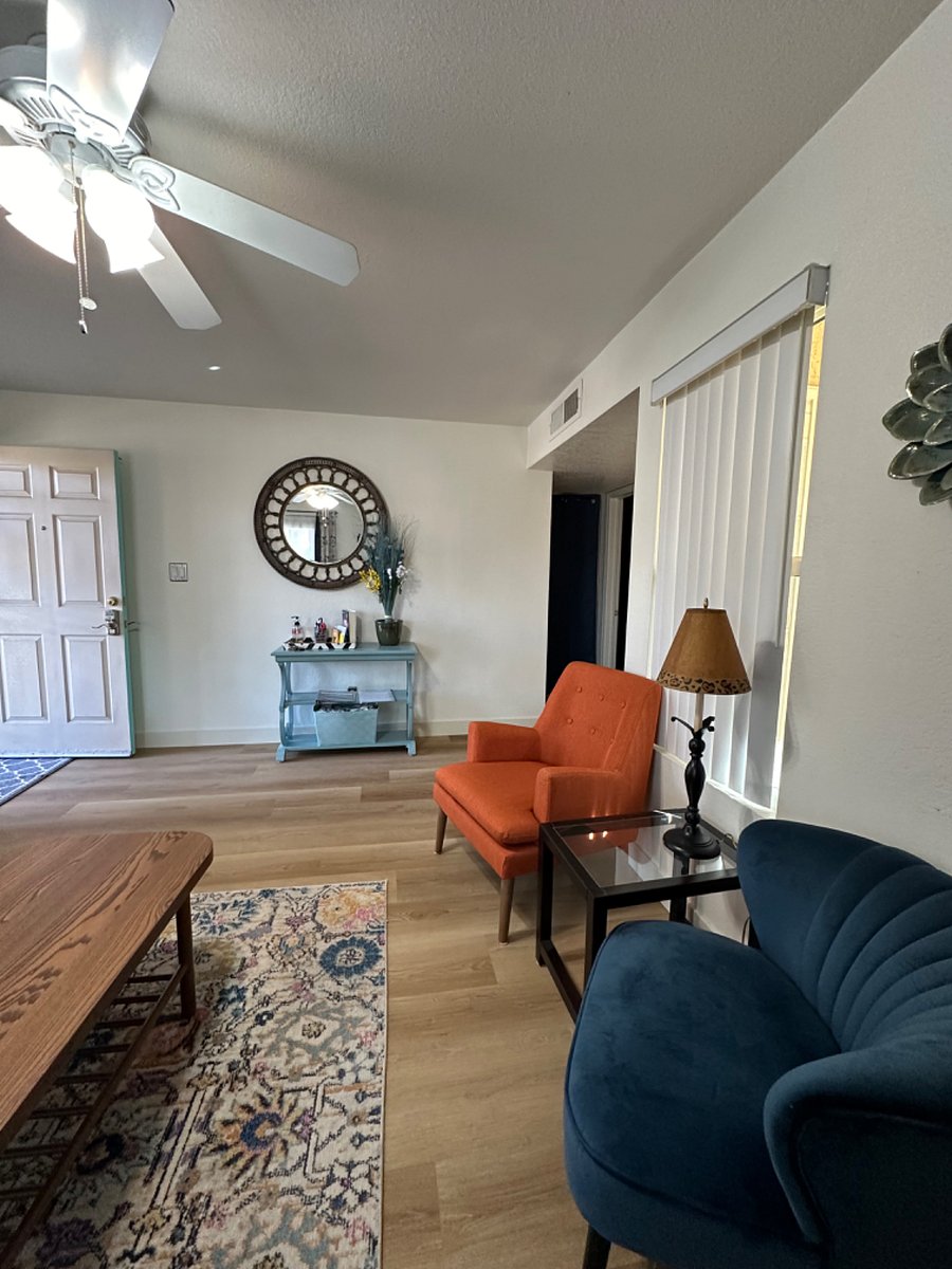 Living area with front entrance to left