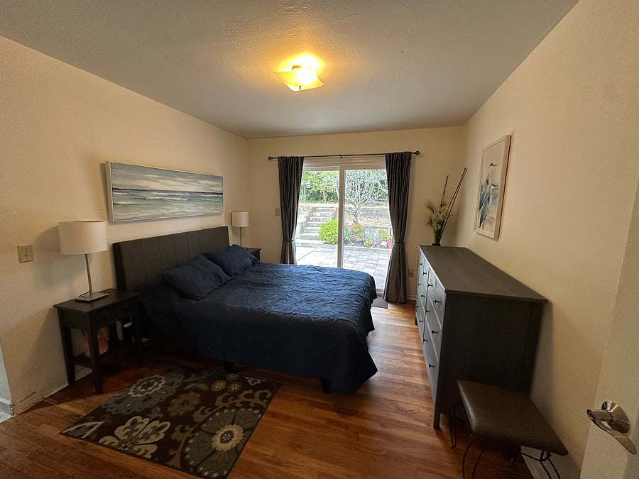 Master Bedroom with access to private tiered gated backyard