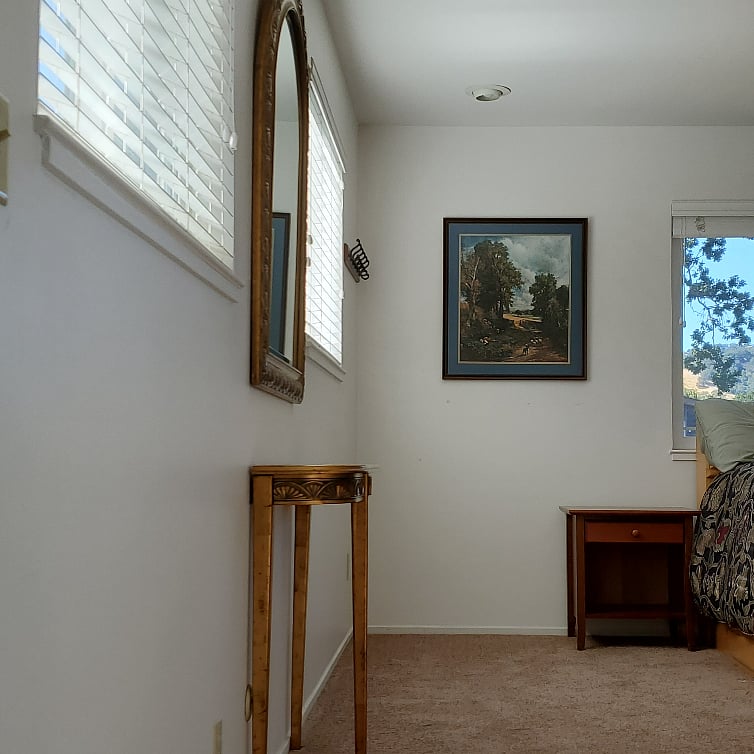 From top of stairwell looking into bedroom
