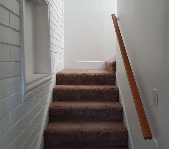 Small staircase up to bedroom