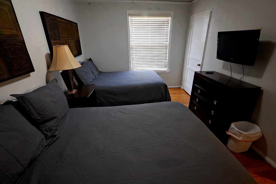 bedroom two with 2 double beds