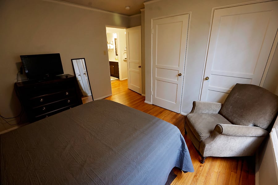Bedroom with queen bed and plenty of closet space