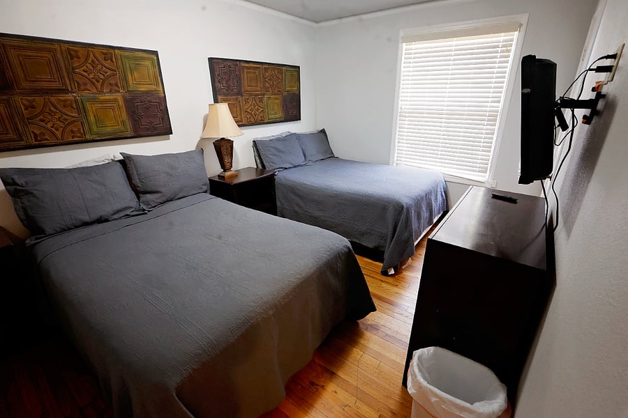 bedroom two with 2 double beds