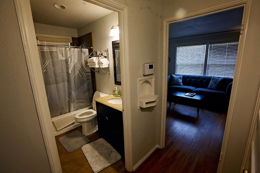 full bathroom with tub and shower