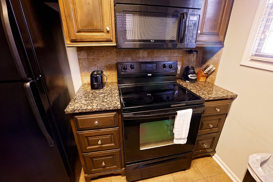 full kitchen- microwave and stove