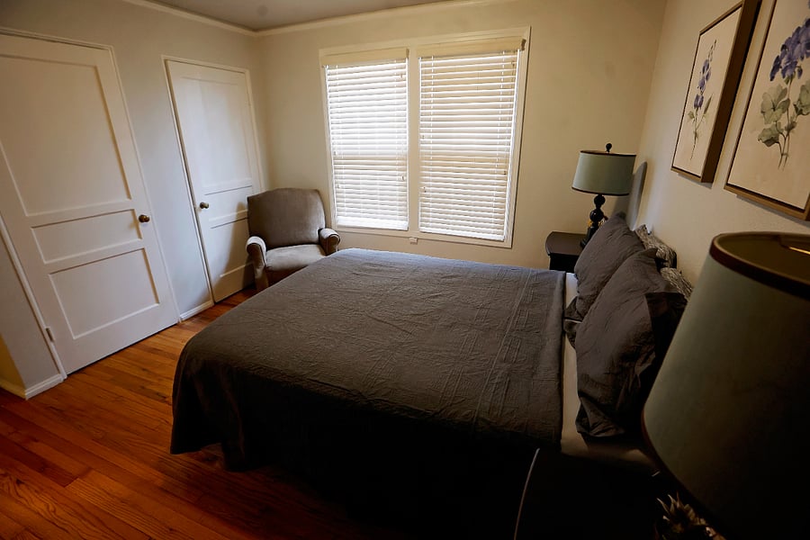 queen bed in main bedroom