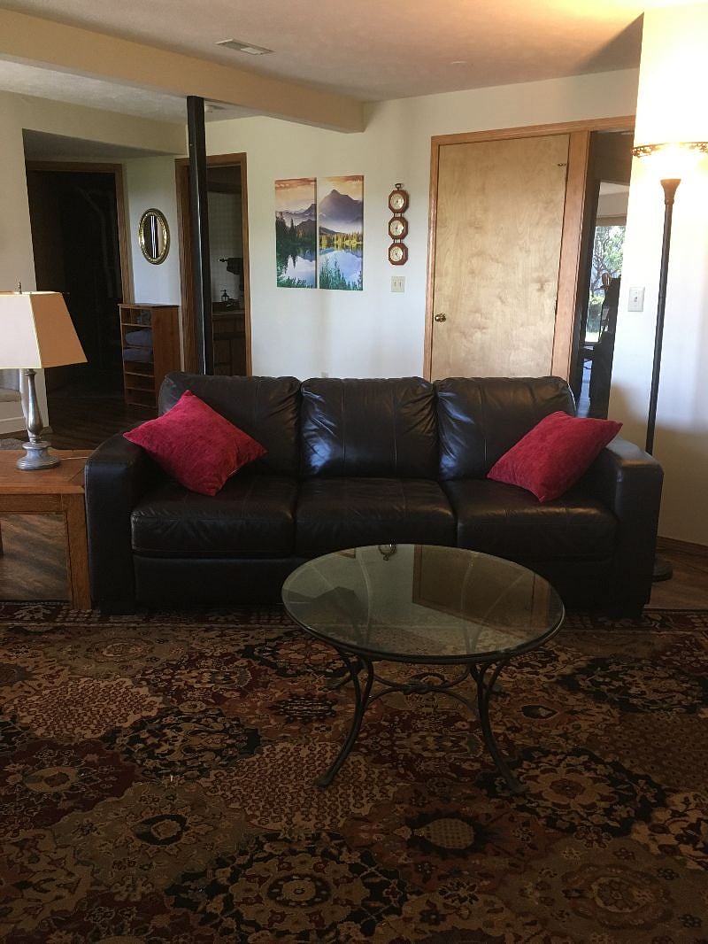 Livingroom sofa and main entrance