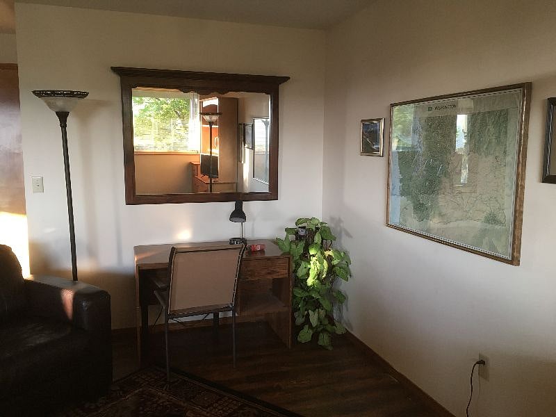 Livingroom desk, mirror and Washington map.